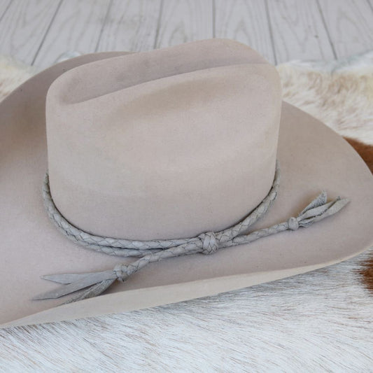 a hat on a fur surface