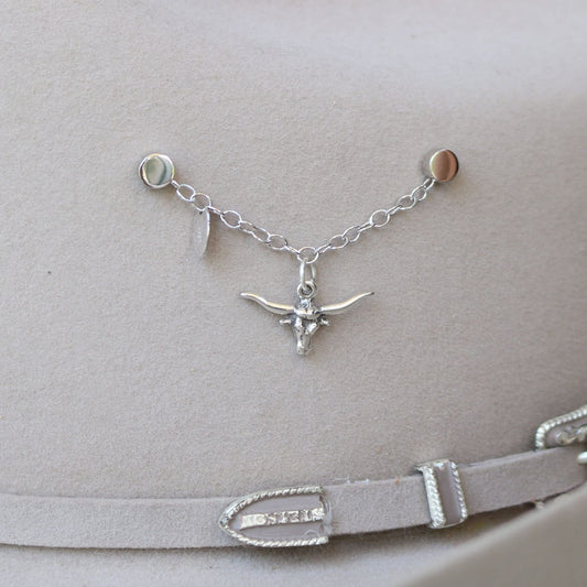 a necklace on a hat