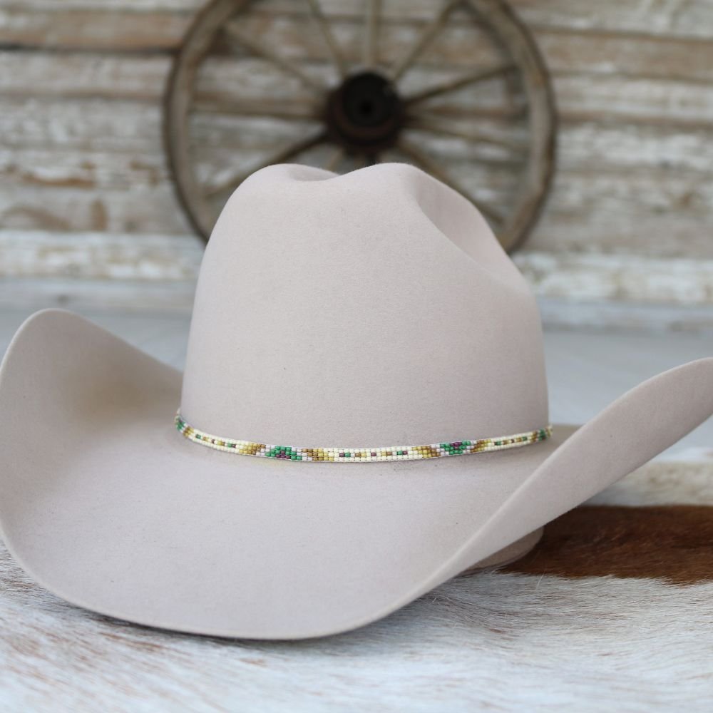 a hat on a white surface