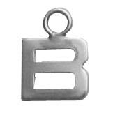 a silver letter b with a ring