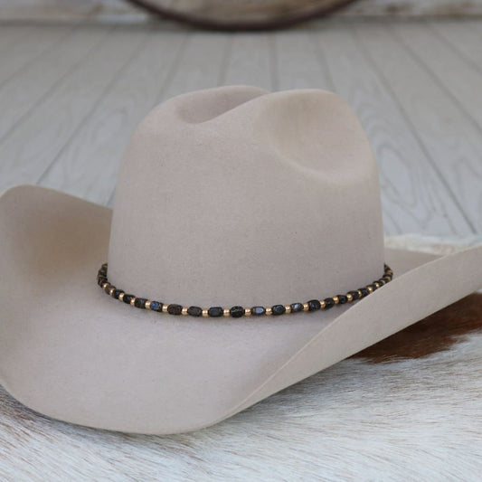 a hat on a white surface