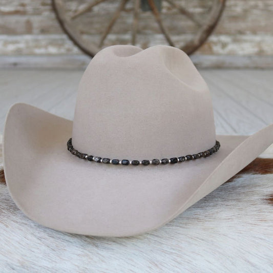 a hat on a fur rug