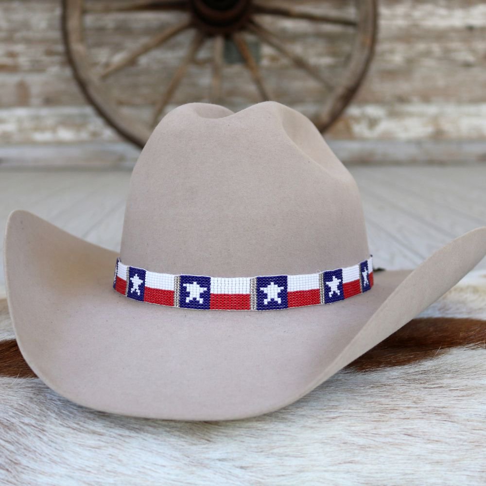 a cowboy hat with a beaded band