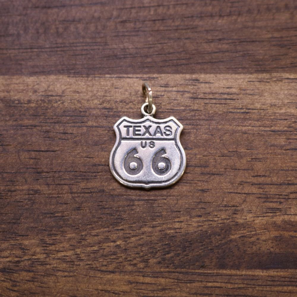 a metal sign with a number on it