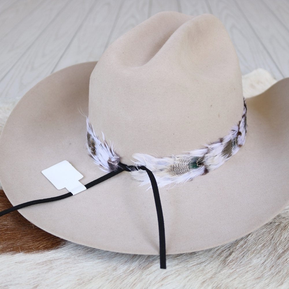 a hat on a rug