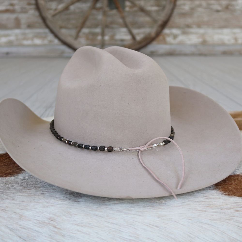 a hat on a white surface