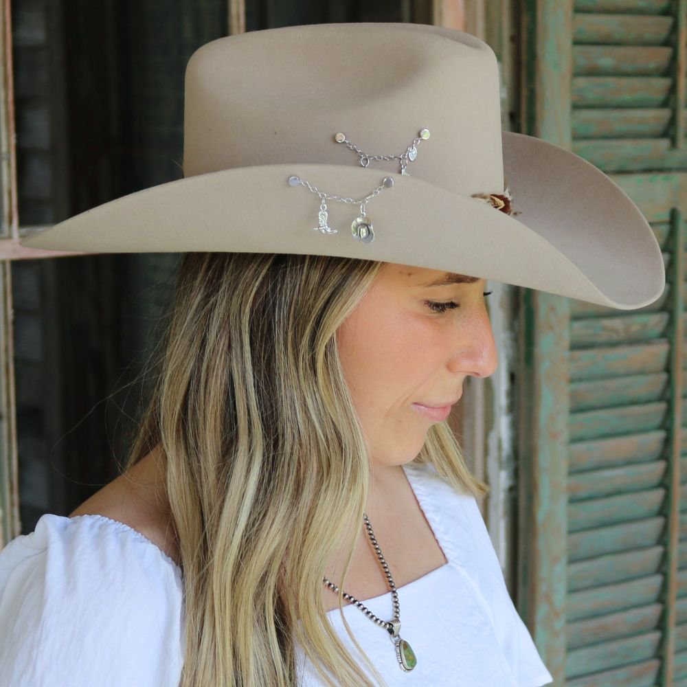 a woman wearing a cowboy hat