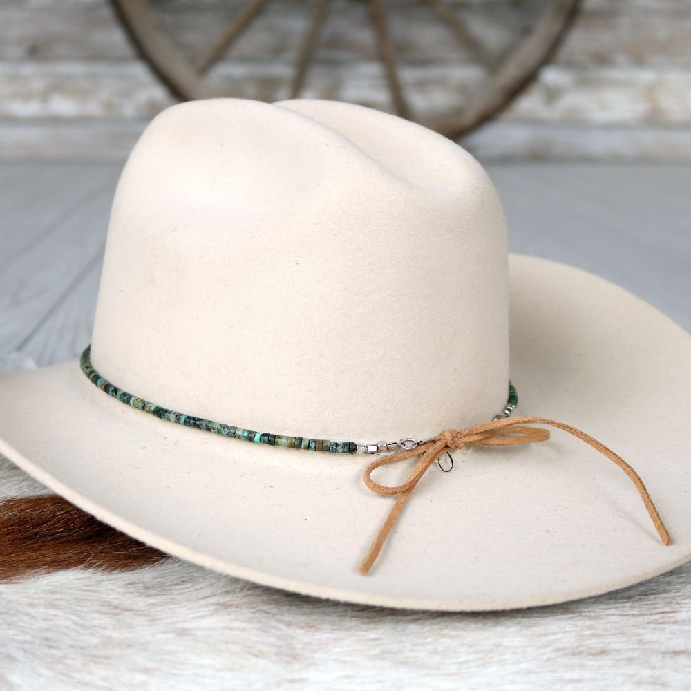 a hat on a fur surface