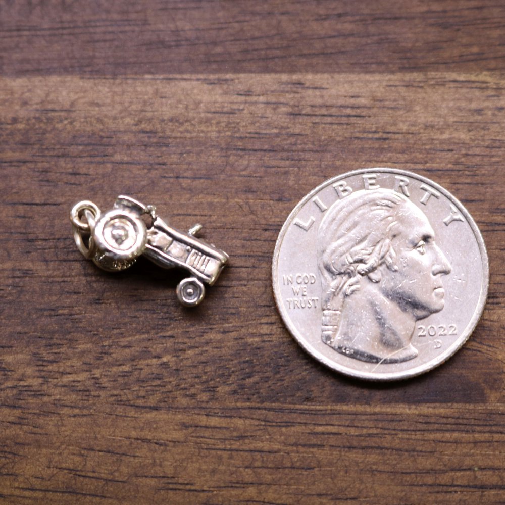 a coin and a small car