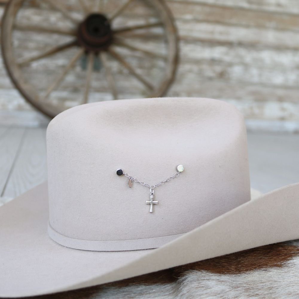 a hat with a necklace on it