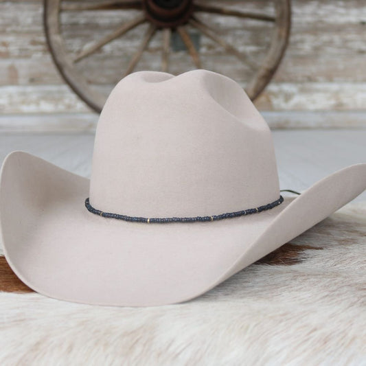 a hat on a fur rug