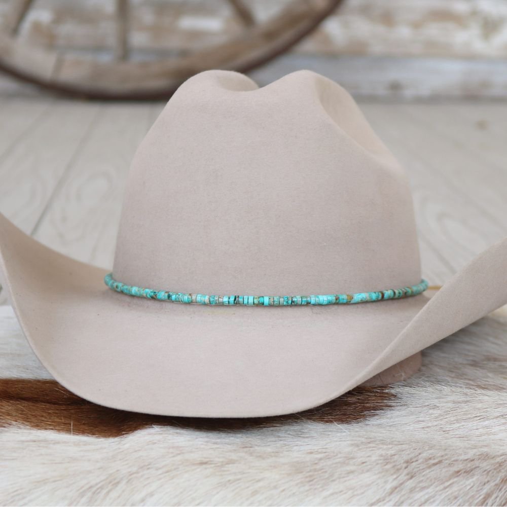 a hat on a fur rug