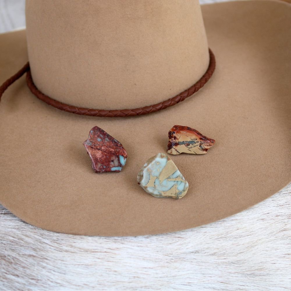 a hat with stones on it