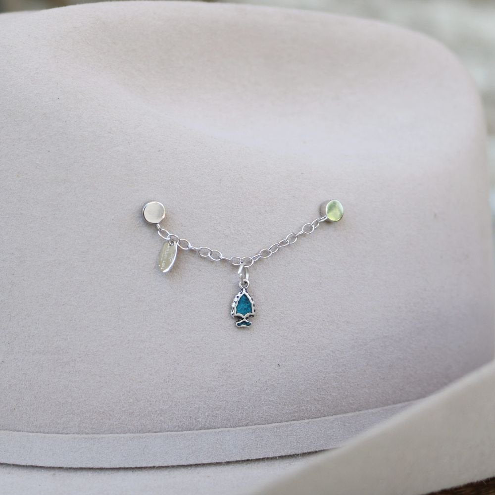 a hat with a necklace