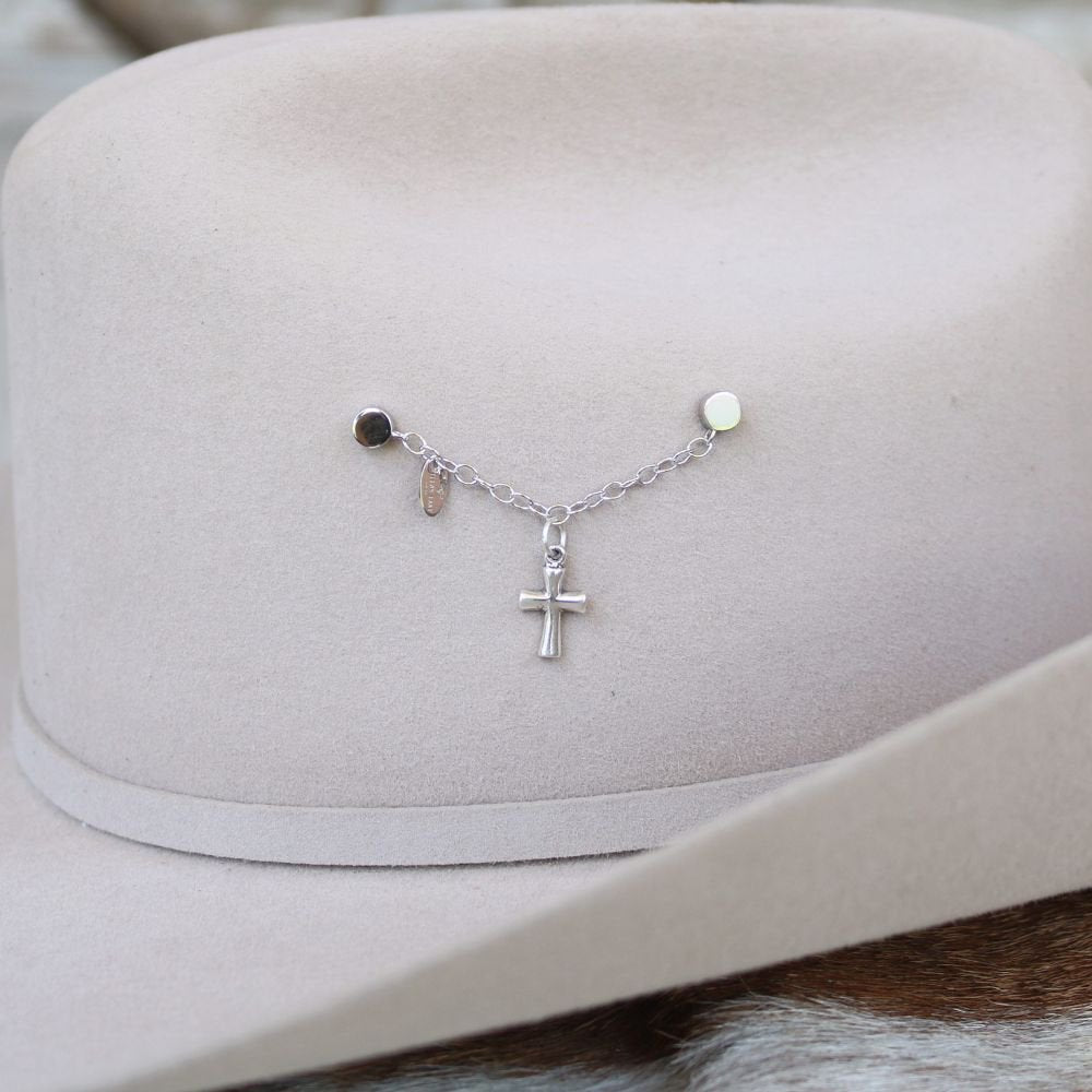a hat with a cross on it