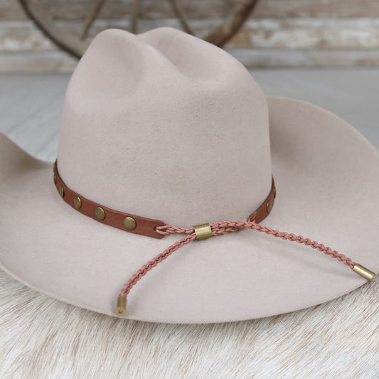 a hat on a fur surface