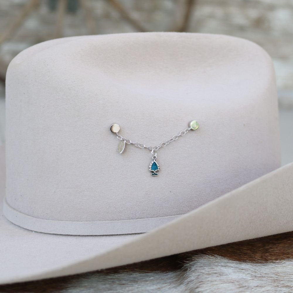 a hat with a necklace on it