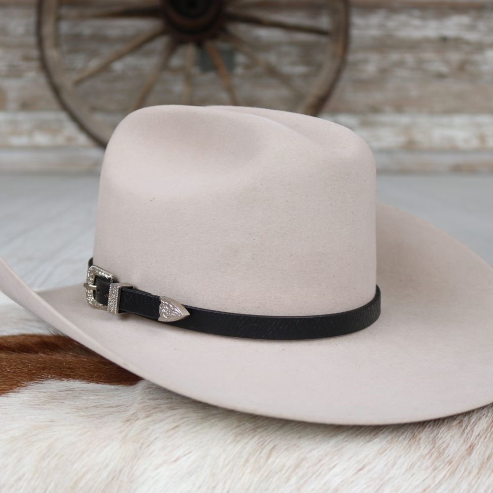a hat on a fur surface